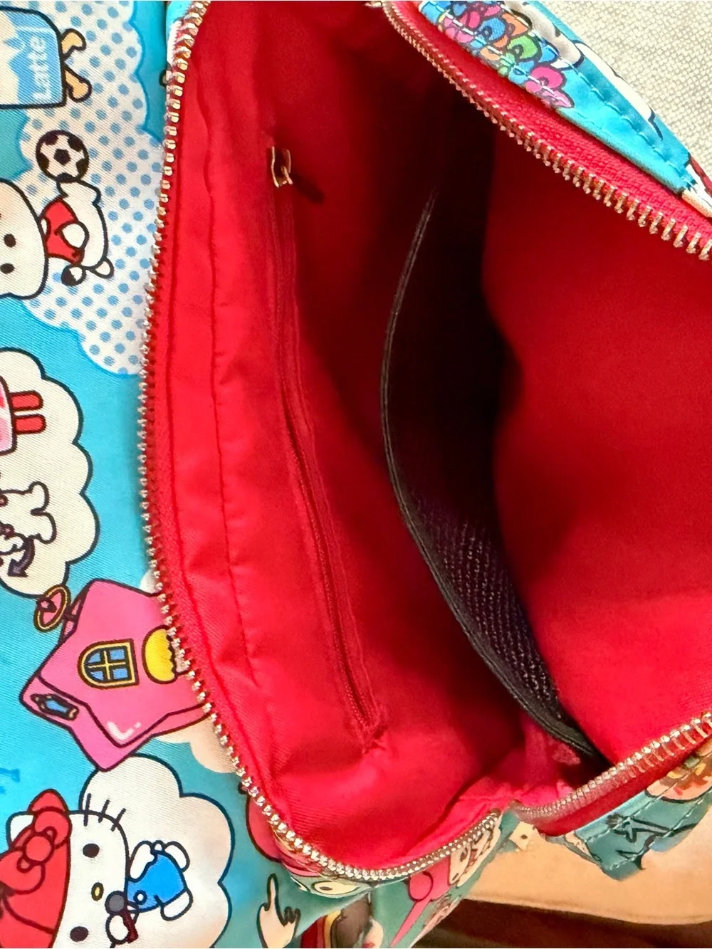 tokidoki x Hello Sanrio for JujuBe Baby Backpack - Bright Blue Rainbow Print